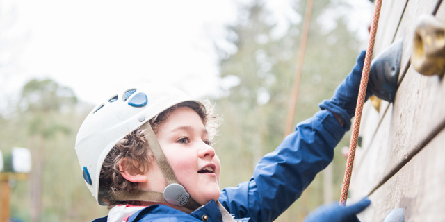 Young person on a climbing wall