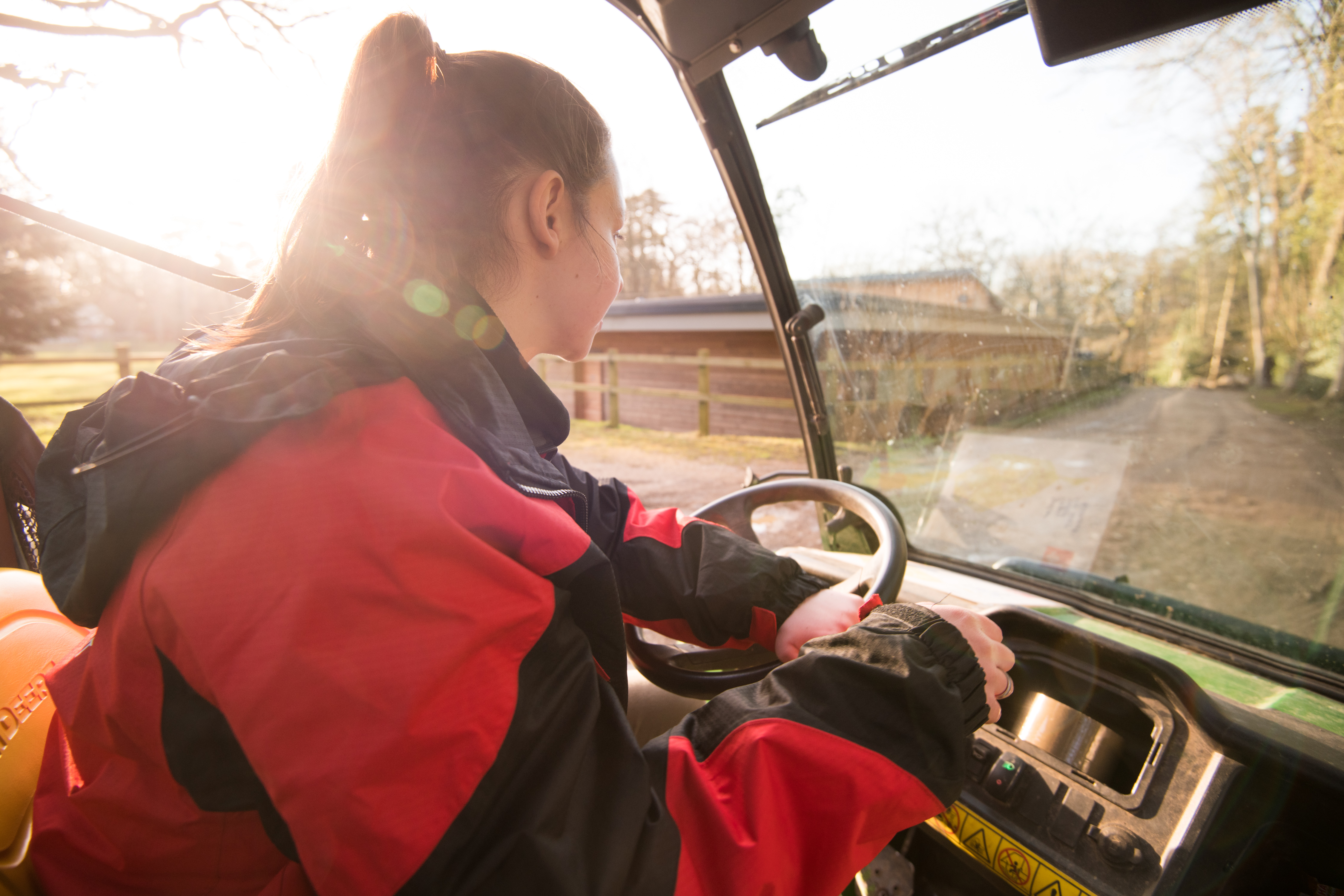 Volunteer driving a vehicle 
