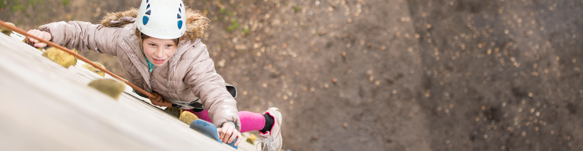 Young person on a climbing wall
